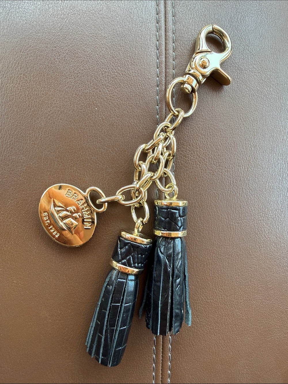 Brahmin leather purse tassel charm, color is Black